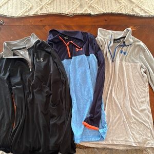 Under Armour YXL (boys) dry-fit t-shirt material pullovers.